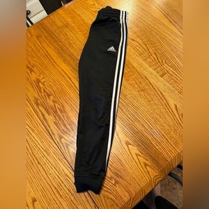 Adidas joggers. Kids size M 10/12 One small hole as shown. Priced accordingly.